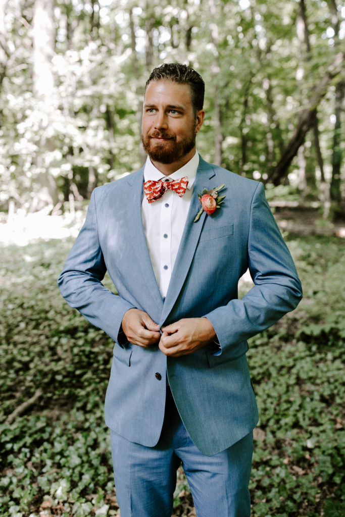 groom and patterned bowtie